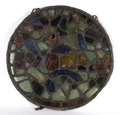 A circular stained glass panel 36d5d3