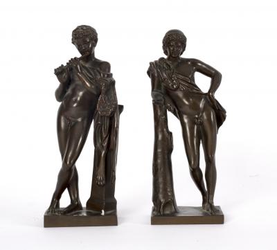 A pair of bronze figures of musicians,