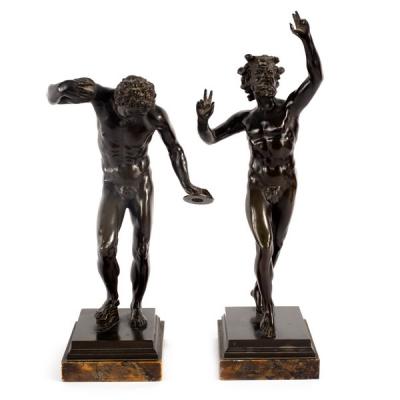 A matched pair of bronze figures