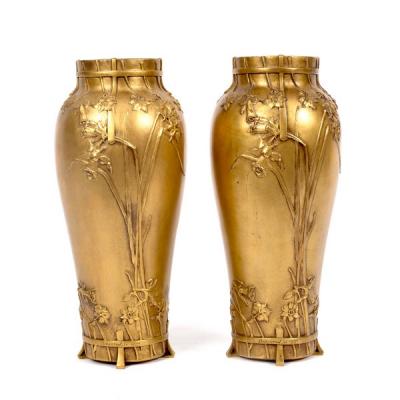 A pair of Art Nouveau bronze vases