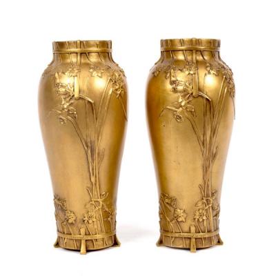 A pair of Art Nouveau bronze vases by