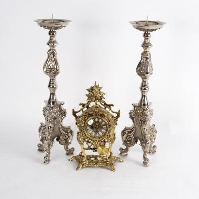 A pair of silvered pricket candlesticks