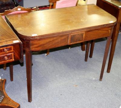 A Regency mahogany tea table with