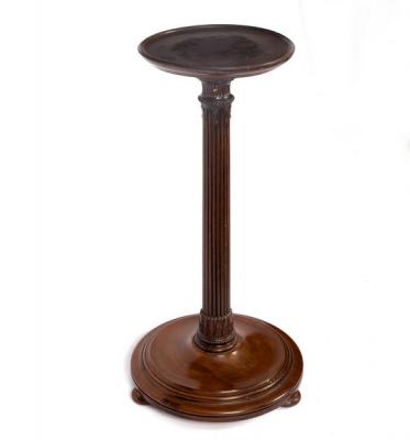 A mahogany jardinière stand with