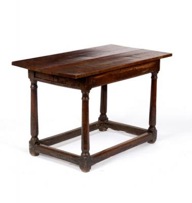 A 17th Century oak table on turned 36d6b0