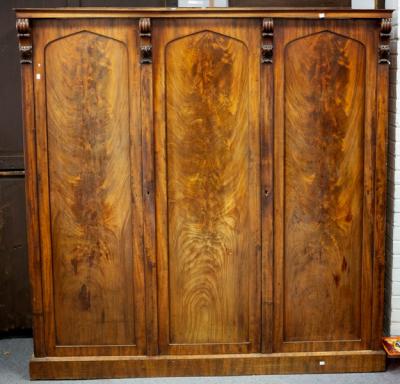 A Victorian mahogany wardrobe enclosed 36d6ad