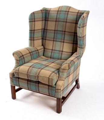 A George III style wing armchair 36d6c8