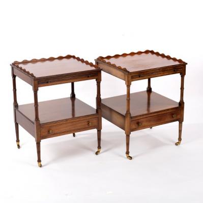A pair of reproduction bedside tables,