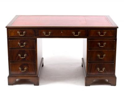 A George III style pedestal desk,