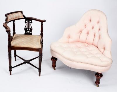 A button upholstered corner armchair