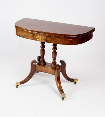 A Regency mahogany and brass inlaid