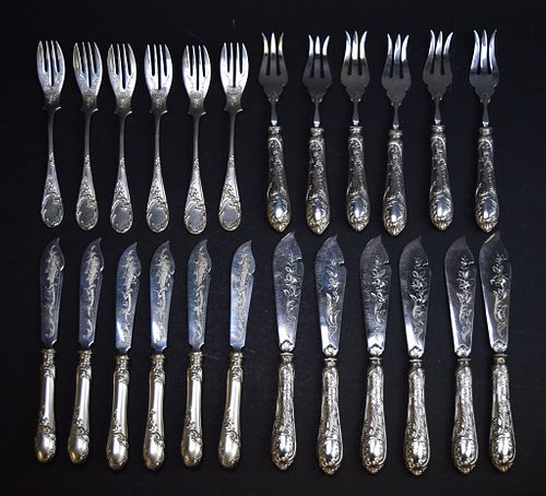 2 SILVER FISH SETS6 fish forks and 6