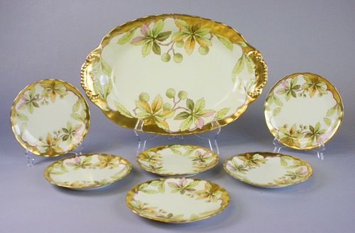 LIMOGES PLATTER AND MATCHING PLATESHand