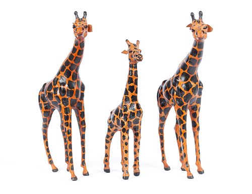 THREE SMALL LEATHER GIRAFFESTHREE