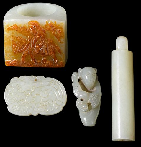 FOUR CHINESE CARVED JADE PIECEScomprising  3709b7