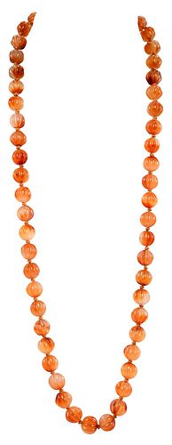 STRAND OF CARVED CARNELIAN BEADS53