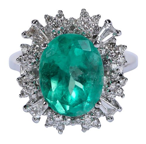 18KT. OVAL EMERALD AND DIAMOND