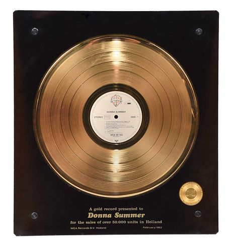 WEA GOLD RECORD ISSUED TO DONNA