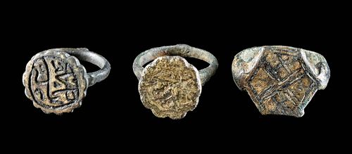 3 MEDIEVAL ISLAMIC BRASS RINGS**Originally