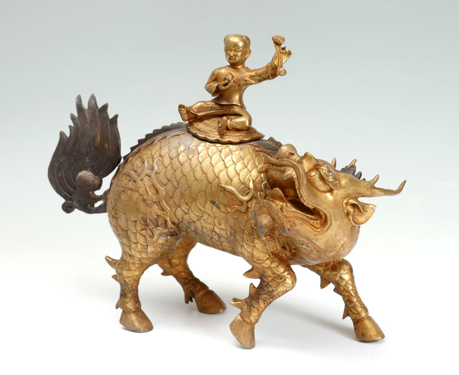 CHINESE GILT BRONZE CHI-LIN WITH