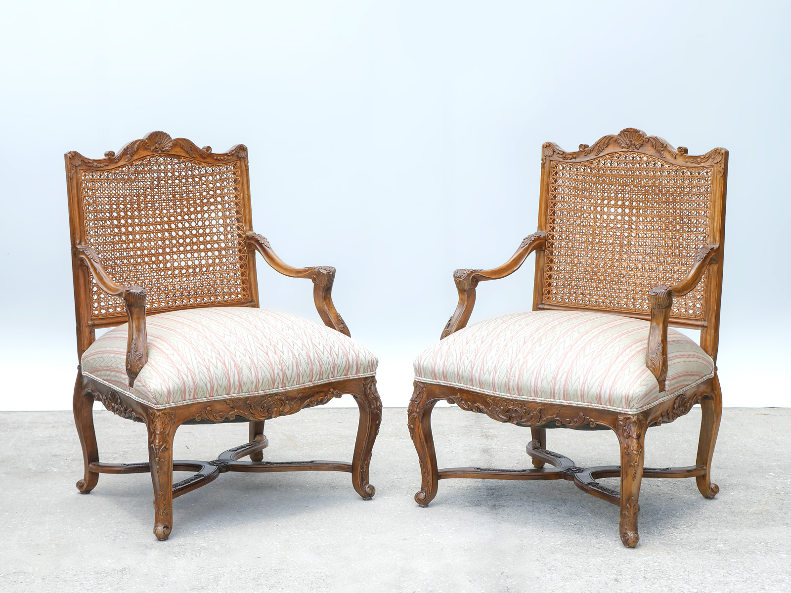 PAIR OF FRENCH CANE BACK ARMCHAIRS: