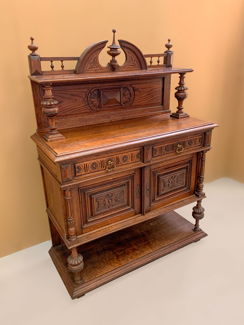 CARVED OAK STEP BACK SIDEBOARD  36f587