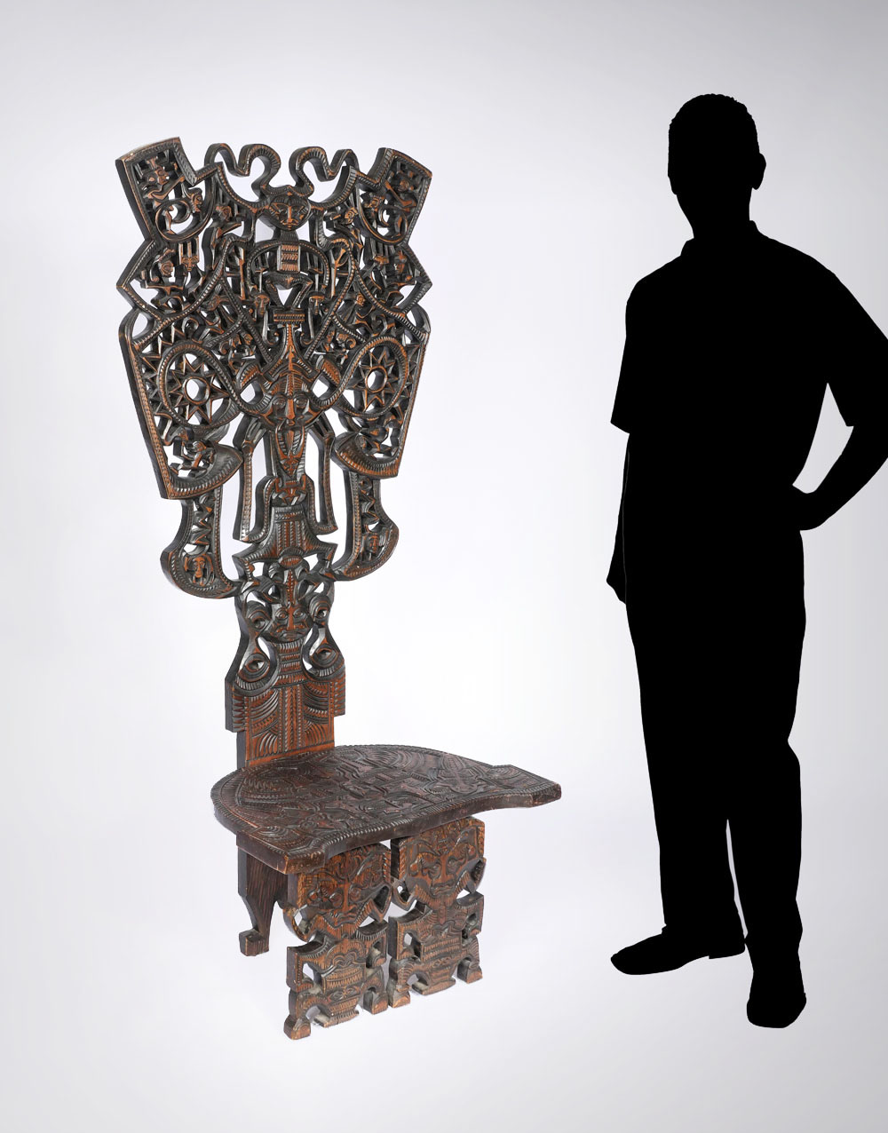 LARGE CARVED AFRICAN CHAIR: Large