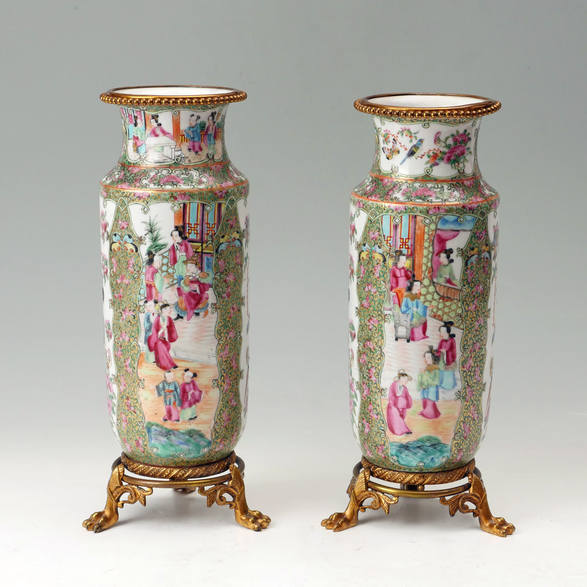 PAIR OF ROSE MEDALLION MOUNTED VASES: