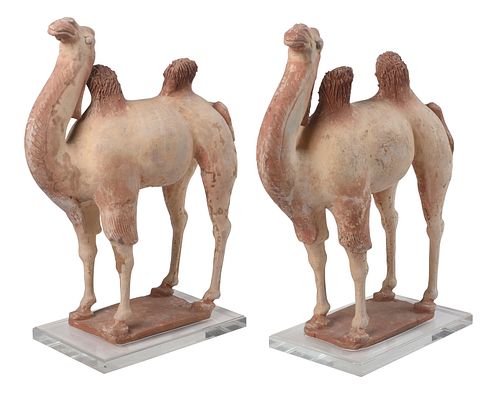 PAIR OF EARLY CHINESE POTTERY CAMELSpossibly