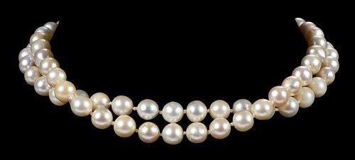 DOUBLE STRAND OF PEARLS WITH 14KT.