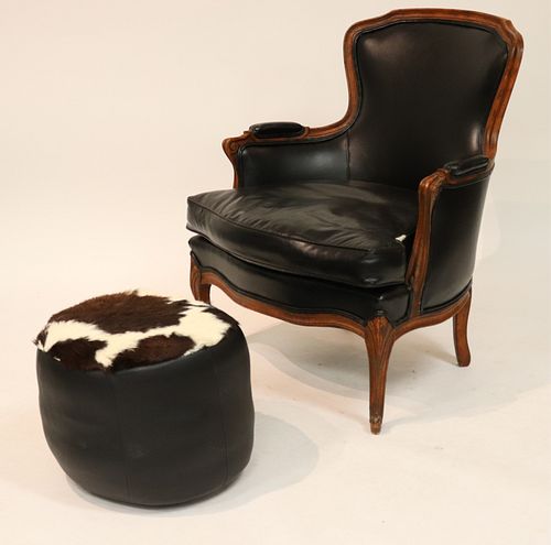 BLACK LEATHER BERGERE AND A POUFCarved