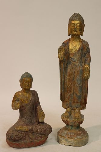 TWO STONE BUDDHA STATUESOne standing