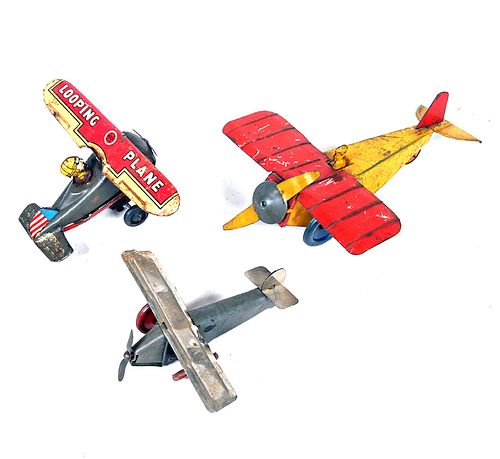 THREE TOY AIRPLANESA group of three