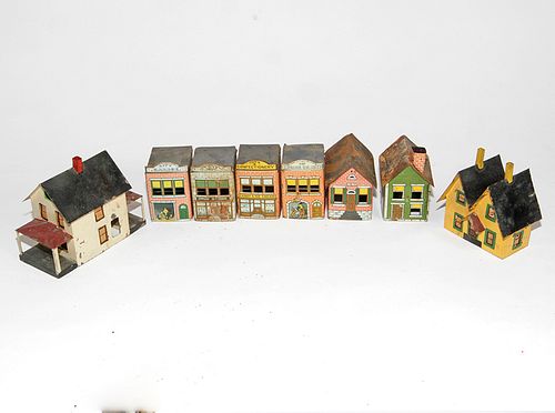 TIN TOY BUILDINGSA group of eight 3739a0