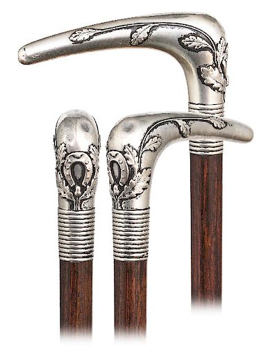 99. SILVER MASCOT CANE -CA. 1890