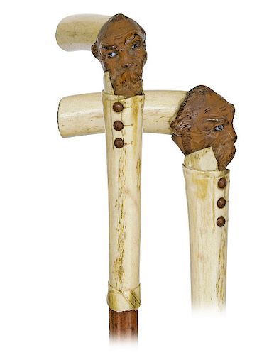 156. BONE AND COQUILLA NUT FIGURAL CANE