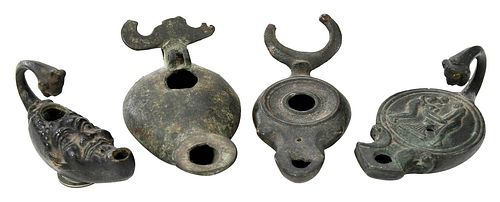 FOUR ROMAN BRONZE OIL LAMPSpossibly