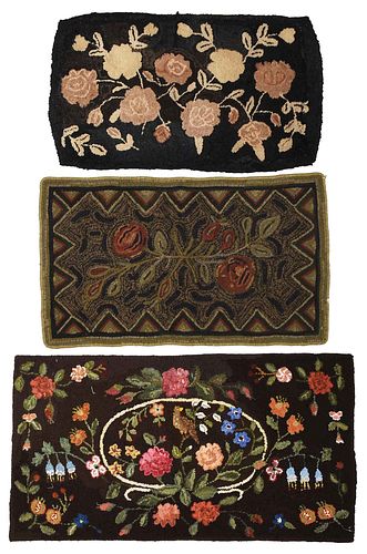 THREE HOOKED RUGS WITH FLORAL DESIGNS20th