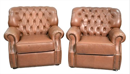 A PAIR OF BROWN LEATHER UPHOLSTERED