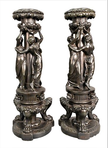 A PAIR OF LARGE PLASTER BLACK-PAINTED