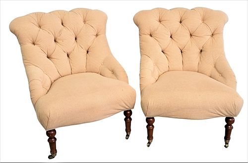 A PAIR OF UPHOLSTERED SLIPPER CHAIRSA