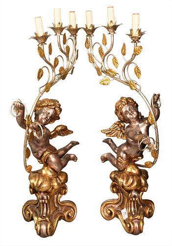 A PAIR OF CONTEMPORARY CARVED PUTTI