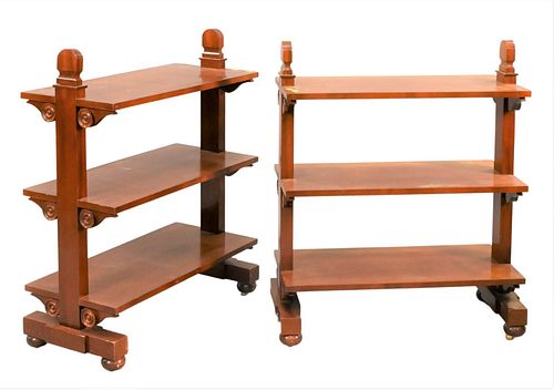 A PAIR OF MAHOGANY THREE TIER TABLESA