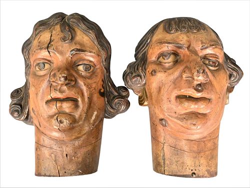PAIR OF CARVED GROTESQUE HEADSPair