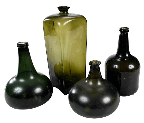 FOUR EARLY OLIVE BLOWN GLASS BOTTLESBritish/Dutch,