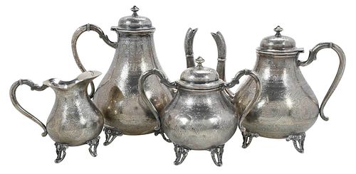 FOUR PIECE EGYPTIAN SILVER TEA