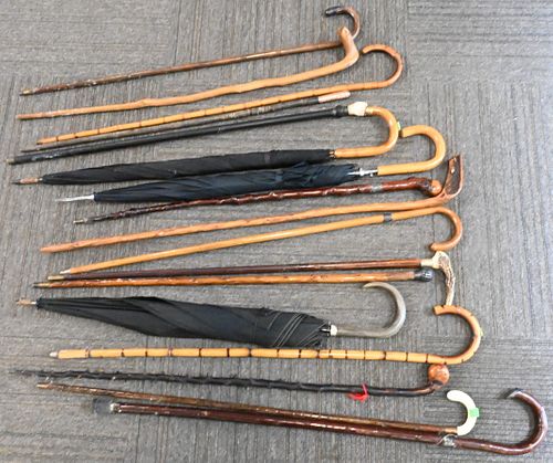 GROUP OF 17 CANES AND UMBRELLASGroup 374b74