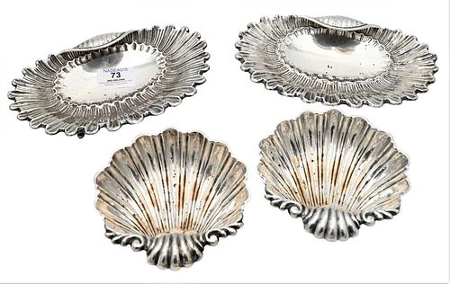 FOUR SILVER SHELL DISHES, TWO MARKED