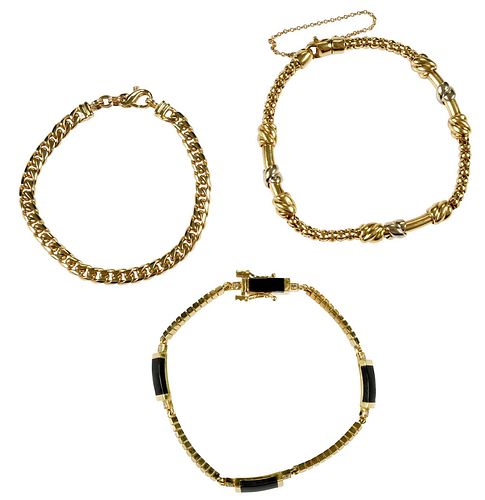 THREE GOLD BRACELETScurb link chain,