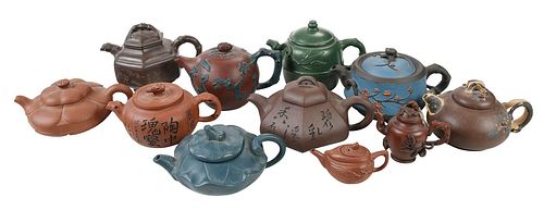 GROUP OF 11 CERAMIC YIXING TEAPOTS20th
